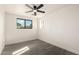 Bedroom features a large window and light grey toned wood flooring at 3044 W Dahlia Dr, Phoenix, AZ 85029