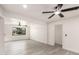 Bright and airy living space featuring sleek hardwood floors, and modern ceiling fans at 3044 W Dahlia Dr, Phoenix, AZ 85029
