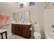 Bathroom with double sinks, lots of counter space, and a shower/tub combo at 3125 W Desert Ln, Laveen, AZ 85339