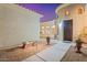 Inviting front entrance featuring a decorative door and landscaped walkway at 3125 W Desert Ln, Laveen, AZ 85339