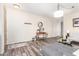 Open-concept living room featuring stylish decor, wood floors, and neutral color palette at 318 E Taylor Trl, San Tan Valley, AZ 85143