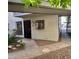 Attractive building exterior with a dark front door, a decorative window, and landscaped walkway at 3420 W Danbury Dr # C130, Phoenix, AZ 85053