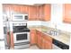 The kitchen boasts stainless steel appliances and beautiful granite countertops at 3420 W Danbury Dr # C130, Phoenix, AZ 85053