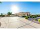 Spacious home with a large driveway and well-maintained landscaping, ideal for comfortable and convenient living at 35662 N Creekside Ln, Queen Creek, AZ 85144