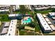 Aerial view featuring a community pool, mature landscaping, and residential buildings at 3820 N 30Th St, Phoenix, AZ 85016