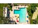 Aerial view of the community pool featuring lounge areas and mature trees at 3820 N 30Th St, Phoenix, AZ 85016