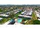Aerial view of a residential community with mature trees and a community pool at 3820 N 30Th St, Phoenix, AZ 85016