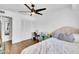 Well-lit bedroom with hardwood floors, closet, and ceiling fan at 3820 N 30Th St, Phoenix, AZ 85016