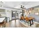 Bright dining area features a wood table with seating for six and stylish decorations on the wall at 3820 N 30Th St, Phoenix, AZ 85016