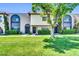 Charming townhome featuring well-maintained landscaping and inviting curb appeal with mature trees at 3820 N 30Th St, Phoenix, AZ 85016