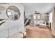 Bright living room featuring stylish decor, a plush sectional, and an open staircase to the second floor at 3820 N 30Th St, Phoenix, AZ 85016
