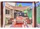 Outdoor patio featuring comfortable seating, stylish decor, and shade at 3820 N 30Th St, Phoenix, AZ 85016