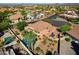 Spacious backyard and pool with lush landscaping, along with neighborhood views showcasing the home's prime location at 4055 N Recker Rd # 71, Mesa, AZ 85215