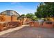 Outdoor kitchen and bar area with built in seating and BBQ at 4055 N Recker Rd # 71, Mesa, AZ 85215