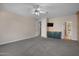 Spacious bedroom with a fireplace and backyard view at 4055 N Recker Rd # 71, Mesa, AZ 85215