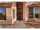 Inviting front entrance with a walkway and desert landscaping at 4055 N Recker Rd # 71, Mesa, AZ 85215