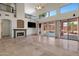 Spacious living room features high ceilings and sliding glass doors that overlook the pool area at 4055 N Recker Rd # 71, Mesa, AZ 85215