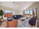 Bright living room with large windows and comfortable furniture at 4055 N Recker Rd # 71, Mesa, AZ 85215