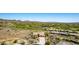 An exclusive desert community featuring golf course views and manicured landscaping at 42145 N Fairgreen Ct, Anthem, AZ 85086