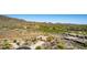 Luxury home overlooking scenic golf course and mountain views within a desert community at 42145 N Fairgreen Ct, Anthem, AZ 85086