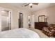 Bedroom features multiple rooms through open doorways and an ensuite bathroom at 42145 N Fairgreen Ct, Anthem, AZ 85086