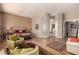 Airy main bedroom showcasing designer touches, natural light, and inviting seating area at 42145 N Fairgreen Ct, Anthem, AZ 85086
