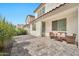 Paver patio with outdoor seating and a low-maintenance desert landscape at 4803 S Ferric --, Mesa, AZ 85212