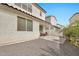 Backyard view showcases low-maintenance landscaping and an outdoor seating area on paver patio at 4803 S Ferric --, Mesa, AZ 85212