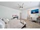 Spacious bedroom featuring a ceiling fan and ensuite bathroom at 4803 S Ferric --, Mesa, AZ 85212