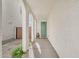 Inviting entryway featuring arched columns and a quaint, sage-green front door at 4803 S Ferric --, Mesa, AZ 85212