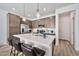 Modern kitchen featuring an island with bar seating and stainless steel appliances at 4803 S Ferric --, Mesa, AZ 85212