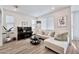 Spacious living area with a comfortable couch, piano, and stylish decor at 4803 S Ferric --, Mesa, AZ 85212