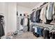 Organized walk-in closet with shelves, hanging rods, and ample storage space at 4803 S Ferric --, Mesa, AZ 85212
