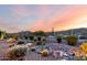 Desert landscaping creates a peaceful ambiance in the backyard at 4946 N 210Th Ave, Buckeye, AZ 85396