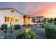 Enjoy the desert landscape from the backyard patio and pergola at 4946 N 210Th Ave, Buckeye, AZ 85396