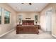 Spacious bedroom featuring neutral walls, a ceiling fan, and carpeted floors at 4946 N 210Th Ave, Buckeye, AZ 85396