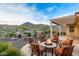 Relax around the custom firepit with desert views at 4946 N 210Th Ave, Buckeye, AZ 85396