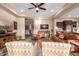 Comfortable living area featuring plush seating and seamless transition to the kitchen space at 4946 N 210Th Ave, Buckeye, AZ 85396