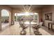 Covered patio featuring comfortable seating and desert views at 4946 N 210Th Ave, Buckeye, AZ 85396
