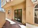 Private back patio featuring green doors, stucco walls and a small window at 5015 E Cheyenne Dr # 14, Phoenix, AZ 85044