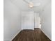 Well-lit bedroom with hardwood flooring, a ceiling fan, and a spacious closet at 5015 E Cheyenne Dr # 14, Phoenix, AZ 85044
