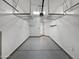 Clean garage with overhead storage racks and plenty of room for parking at 5015 E Cheyenne Dr # 14, Phoenix, AZ 85044