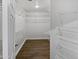 Bright walk-in closet with custom shelving for ample storage space at 5015 E Cheyenne Dr # 14, Phoenix, AZ 85044