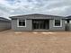 Backyard features a patio area and ample space for landscaping and outdoor enjoyment at 5634 W Olney Ave, Laveen, AZ 85339