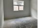 Cozy bedroom with a window, awaiting your personal touch and decor at 5634 W Olney Ave, Laveen, AZ 85339