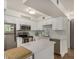 Contemporary kitchen with stainless appliances, white cabinetry, and bright lighting at 602 N May St # 65, Mesa, AZ 85201