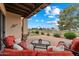 Covered back patio features plenty of seating with a view of a golf course at 6202 E Mckellips Rd # 65, Mesa, AZ 85215
