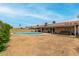 The backyard features a large in-ground swimming pool at 6416 S 19Th Pl, Phoenix, AZ 85042