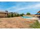 Spacious backyard featuring a refreshing swimming pool and ample room for outdoor activities at 6416 S 19Th Pl, Phoenix, AZ 85042