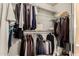 Functional walk-in closet with shelving and hanging space for ample storage solutions at 6416 S 19Th Pl, Phoenix, AZ 85042